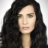 Tuba Buyukustun as Elif Denizer