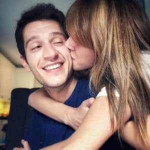 Melis Isiten is kissing her spouse Uraz Kaygilaroglu
