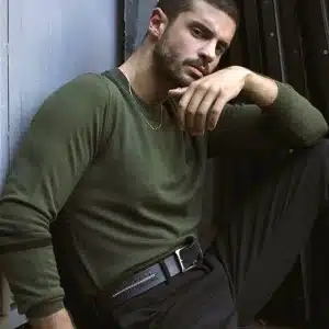 Berk Oktay green sweater