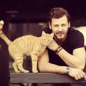 Umit Ibrahim Kantarcilar with yellow cat