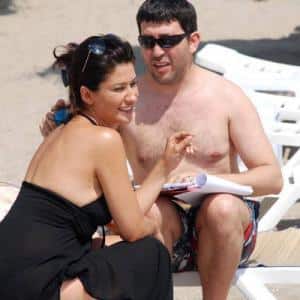 Iclal Aydin and Emre Kinay in beach